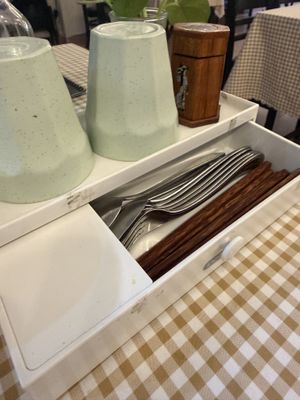 Adorable silverware drawer on the table   at Moc Chan Vegan in Da Nang