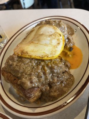 Biscuits and gravy with sunny side egg  at Street Beet in Detroit