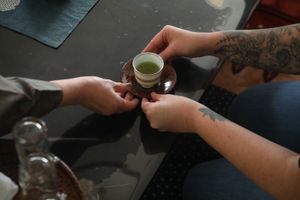 We begin with a welcome toast of Japanese tea. at BASAMA's Kitchen in Tsuruta