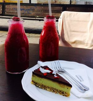 Forest fruit and raspberry milkshakes (rice milk) with kiwi raw cake. at San Domenico Caffe in Kosice
