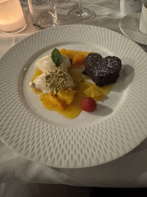 Valentine's Day Dessert Variation (Cappuccino Mousse, Chocolate Brownie, Citrus Fruit Ragout)  at Restaurant Stella Freiburg in Freiburg