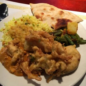 buffet plate with; lemon rice, Dali, brand and potatoes, fried veggies and nan.  at Masala Indian Cuisine in South Daytona