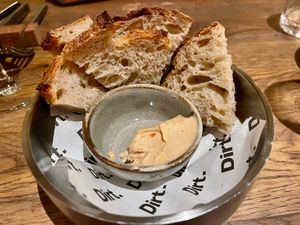 Homemade bread with miso butter, very tasty!

(Menu April 2026) at Dirt.  in Ghent