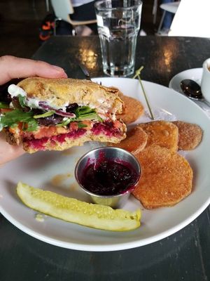 Burger with beet ketchup and sweet potato fries at Avo in Nashville