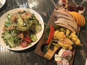 Vegan cheese plate and salad at Avo in Nashville