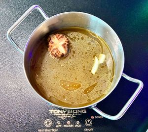 Mushroom broth  at Tony Wong - Hot Pot Restaurant - JVC in Dubai