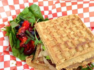 Veggie burger on waffle bun, topped with spicy mayo, with a salad on the side using local produce. Meal is completely vegan (she uses a vegan waffle recipe, and vegan mayo!) at Emergency Munchie Truck in West Lafayette