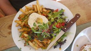 lion meat steak with egg at Plantuguese in Bristol