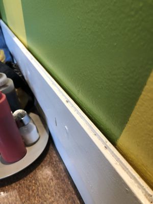 All the walls were filled with dirty food or dust  at Tamarind Vietnamese Grill and Noodle House in Calgary