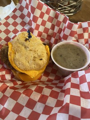 Biscuit breakfast sándwich with side of gravy  at Shambala Bakery and Bistro in Mount Vernon