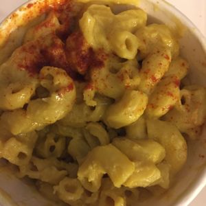 Mac and cheese.  bite missing I couldn't resist  at Three Carrots - City Market in Indianapolis