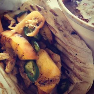 grilled pineapple and seitan sandwich. special for Gen Con. one of many delicious seitan entrees! at Three Carrots - City Market in Indianapolis