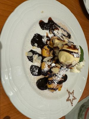 Waffles with ice cream, hot chocolate sauce, bananas and cream   at Kraut & Ruben in Bad Hofgastein