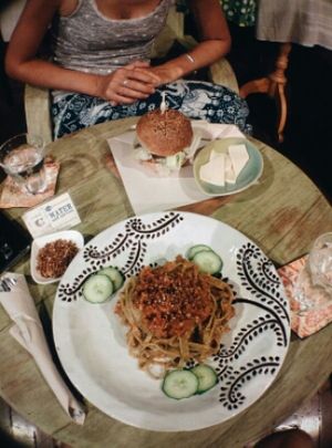 veggie burger with 'cheese' and rice noodles with bolognese sauce at Amrita Garden in Chiang Mai