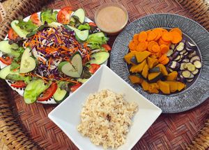 Huge mixed salad , brown rice & steamed vegetables  at Amrita Garden in Chiang Mai