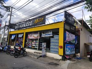 Behind and on the right of this shop before Tesco at Chiang Mai Bread in Chiang Mai