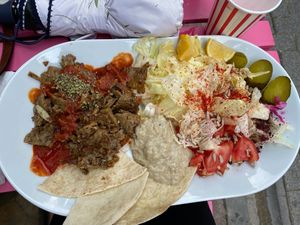 Plate of the day - Seitan in tomatoe sauce, babaganoush, salad, Turkish bread at Vegan Community Kitchen in Istanbul