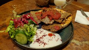 Kebab was OK. Too highly priced. Hard bread. Good salad dressing, mediocre tomato sauce. at Vegan Community Kitchen in Istanbul