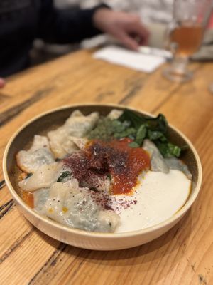 Spinach ravioli with vegan yogurt saucee  at Vegan Community Kitchen in Istanbul