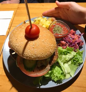 Very big Vegan Burger with potatoes and salad  at Vegan Community Kitchen in Istanbul