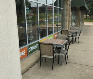 Outdoor seating July 2023 at Spiral Food Co-Op in Hastings