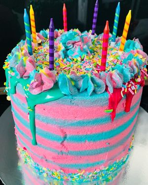 Brights and stripes vegan celebration cake  at The Tree Rooms in Newcastle Upon Tyne