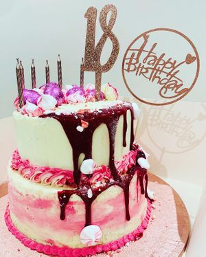 Vanilla sponge celebration cake with a white chocolate drip and palma violet flavoured buttercream  at The Tree Rooms in Newcastle Upon Tyne