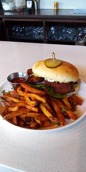Chickpea cutlets with mushroom bacon on a bun | fries | house made ketchup at Modern Love in Omaha