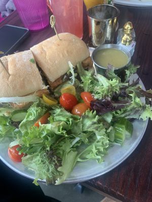 Lemongrass “chik’n” sandwich with side salad.  at Modern Love in Omaha