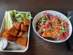 The buffalo wings and the spicy peanut tofu bowl.   at Modern Love in Omaha
