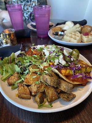 Tofu Benedict (chicken and waffles in the background)  at Modern Love in Omaha