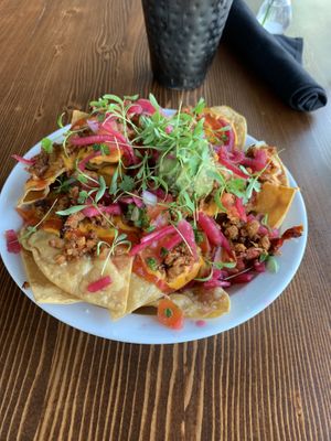 Vegan nachos with melted cashew cheese. Delicious   at Modern Love in Omaha