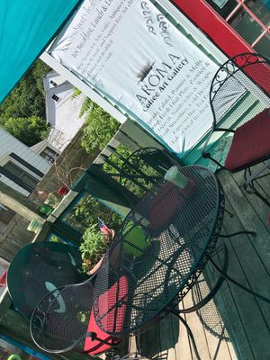 outdoor patio in summer  at Aroma Coffee Art Gallery in Hammondsport