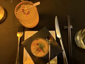 Carrot turmeric ginger coconut milk soup with tropic alkemē mocktaill  at Alkemē in Santa Fe