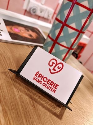 Visit card at Epicerie Glu in Paris