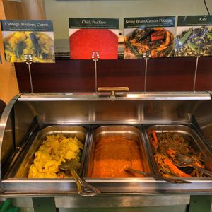 Cabbage, potatoes, carrots; chick pea stew; string beans, carrots  at Rahel's Vegan Cuisine in Los Angeles