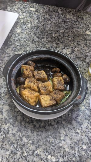 Tofu and mushrooms with bean sauce at Tilly Vegan in Ho Chi Minh City