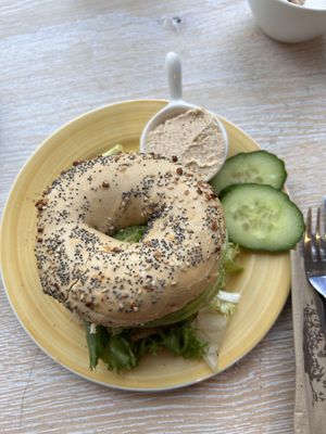 avocado, salad, tomato pesto cream cheese on everything bagel  at Bagels & Beans - Roetersstraat in Amsterdam