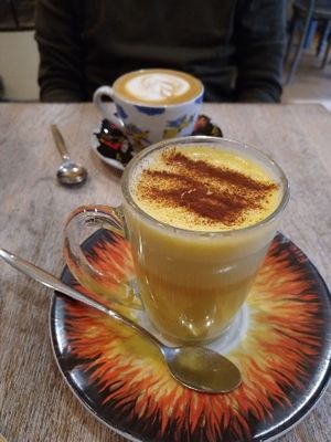 golden milk tea with almond milk  at Bagels & Beans - Van Baerlestraat in Amsterdam