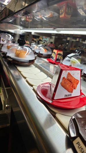 Inari at Kura Revolving Sushi Bar in Glendale