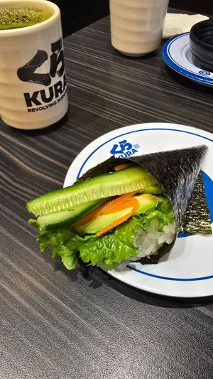 Veggie hand roll to order at Kura Revolving Sushi Bar in Glendale