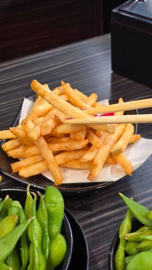 French fries to order at Kura Revolving Sushi Bar in Glendale