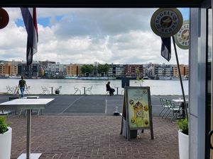 Terras aan het water  at Bagels & Beans - Veemkade in Amsterdam