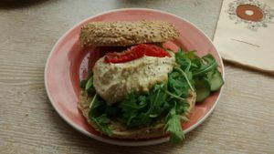 Bagel with hummus and dried tomatoes at Bagels & Beans - Waterlooplein in Amsterdam