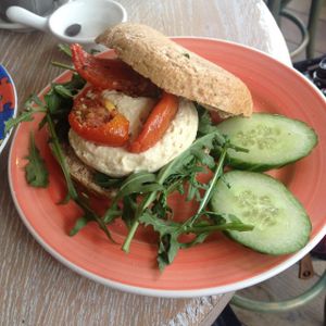 Wholewheat Spelt bagel + hummus + sun-dried tomatoes + rucola + cucumber at Bagels & Beans - Waterlooplein in Amsterdam
