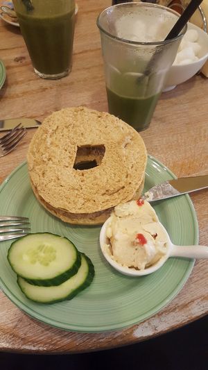 Sourdough bagel with red bell pepper vegan cream cheese at Bagels & Beans - Waterlooplein in Amsterdam