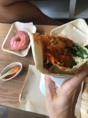 Veggie wrap loaded with hot sauce!  at Vegabond - Leliegracht in Amsterdam