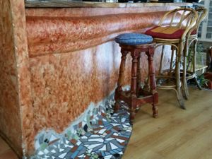 The bar and the original decoration on the  floor.  at Tiyoweh La Quietud in Madrid