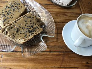 Toast and coffee at Tiyoweh La Quietud in Madrid