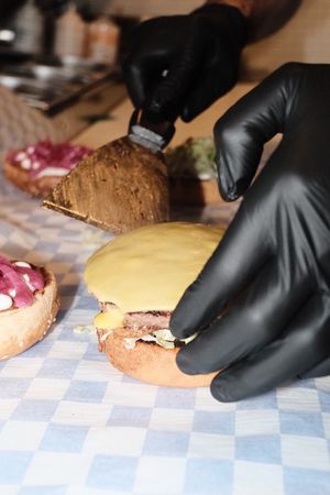Burger being made Inside Dirty V in Torggata, Oslo at Dirty V - Oslo in Oslo